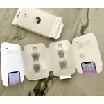 جعبه و بسته‌بندی بازشده ردیاب هوشمند اپل مدل AirTag پک ۴ عددی به همراه راهنمای اتصال به آیفون